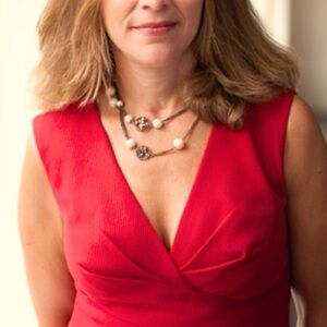 A timeless red dress that is fully lined.